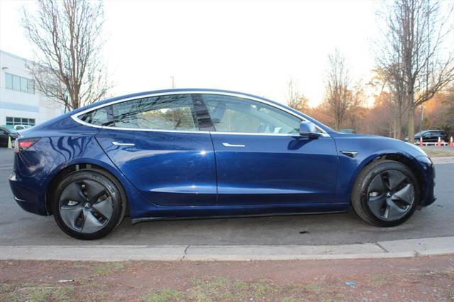 Photo of 2018 Deep Blue Metallic Tesla Model 3