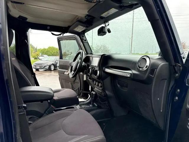 Photo of 2013 True Blue Pearlcoat Jeep Wrangler Unlimited
