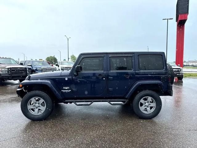 Photo of 2013 True Blue Pearlcoat Jeep Wrangler Unlimited