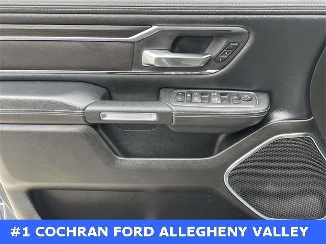 Photo of 2024 Patriot Blue Pearlcoat RAM 1500