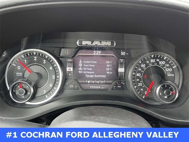 Photo of 2024 Patriot Blue Pearlcoat RAM 1500