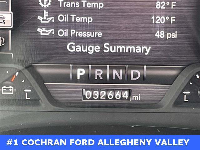 Photo of 2024 Patriot Blue Pearlcoat RAM 1500
