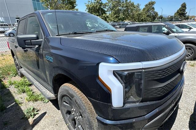 Photo of 2025 Blue Metallic Ford F-150 Lightning