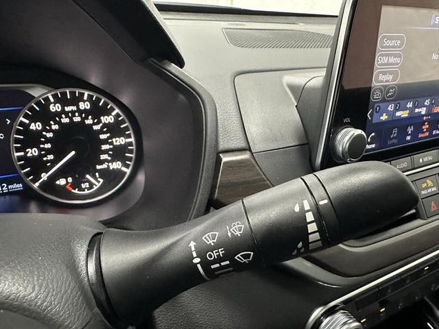 Photo of 2024 Pearl White Tricoat Nissan Altima