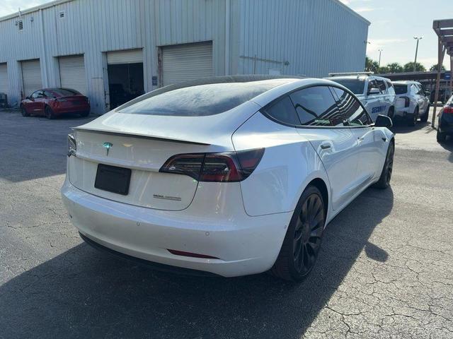 Photo of 2022 Pearl White Multi-Coat Tesla Model 3