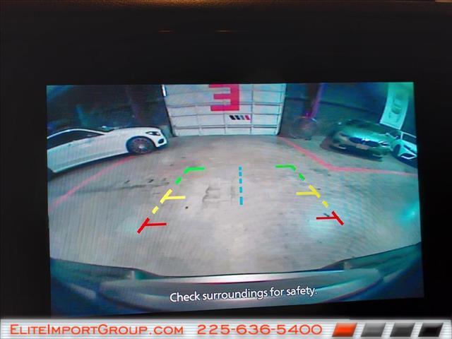 Photo of 2022 Cardinal Red Tricoat Nissan Frontier