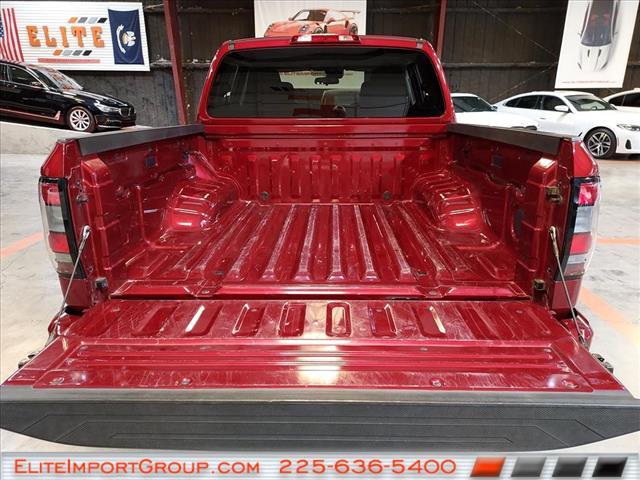 Photo of 2022 Cardinal Red Tricoat Nissan Frontier