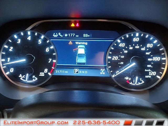 Photo of 2022 Cardinal Red Tricoat Nissan Frontier
