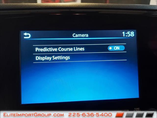 Photo of 2022 Cardinal Red Tricoat Nissan Frontier