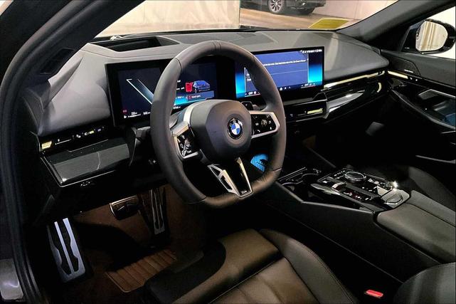 Photo of 2024 Carbon Black Metallic BMW 530