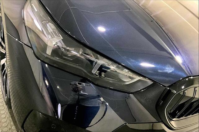 Photo of 2024 Carbon Black Metallic BMW 530