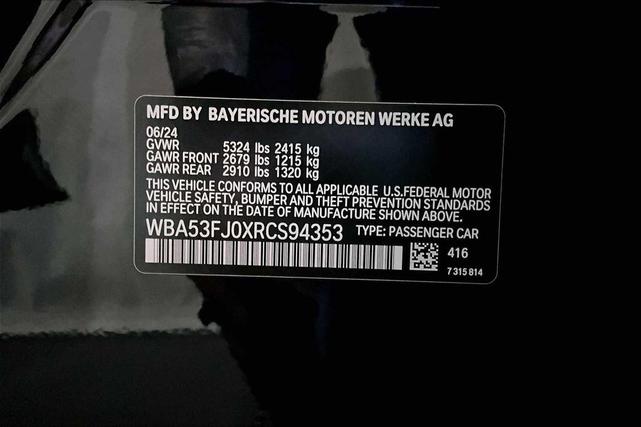 Photo of 2024 Carbon Black Metallic BMW 530