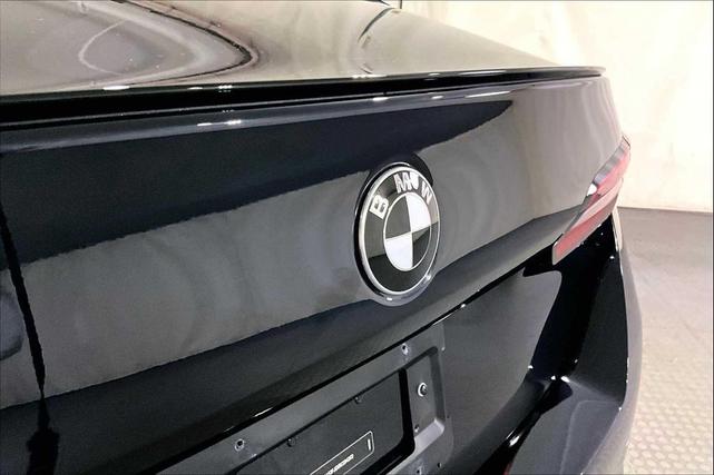 Photo of 2024 Carbon Black Metallic BMW 530