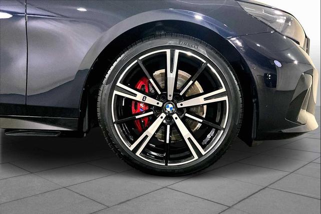 Photo of 2024 Carbon Black Metallic BMW 530