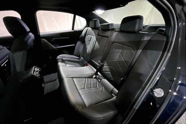 Photo of 2024 Carbon Black Metallic BMW 530