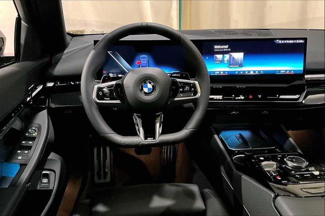 Photo of 2024 Carbon Black Metallic BMW 530