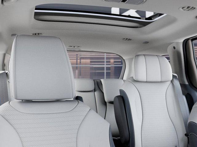 Photo of 2026 Snow White Pearl Kia Carnival Hybrid