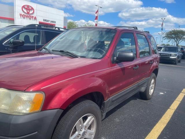 Photo of 2003 Red Fire Clearcoat Metallic Ford Escape