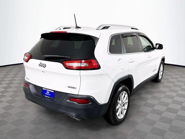 Photo of 2016 Bright White Clearcoat Jeep Cherokee