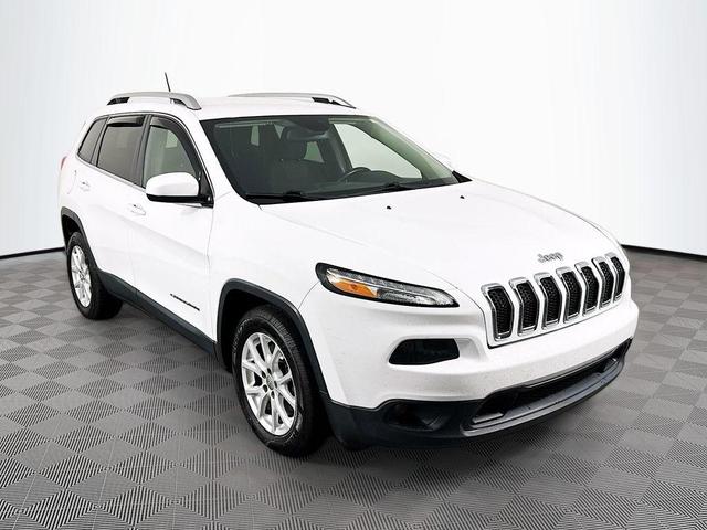 Photo of 2016 Bright White Clearcoat Jeep Cherokee