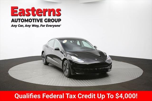 Photo of 2019 Solid Black Tesla Model 3