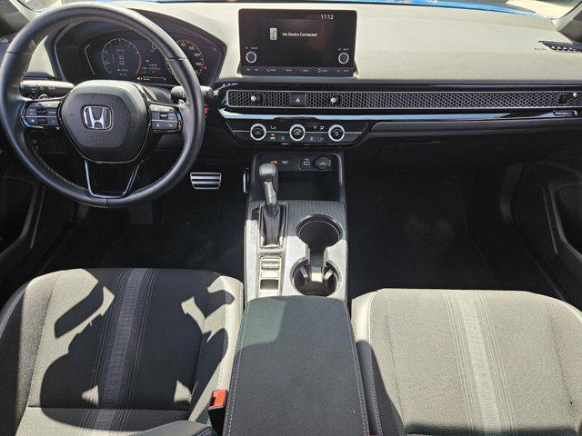 Photo of 2024 Boost Blue Pearl Honda Civic