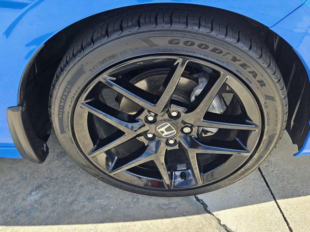 Photo of 2024 Boost Blue Pearl Honda Civic