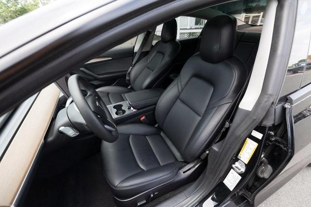 Photo of 2022 Black Tesla Model 3