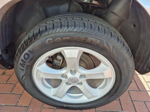 Photo of 2010 Bright Silver Kia Sportage