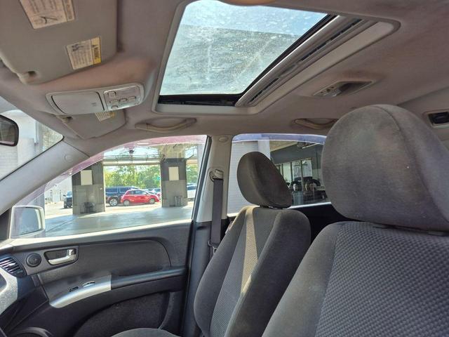 Photo of 2010 Bright Silver Kia Sportage