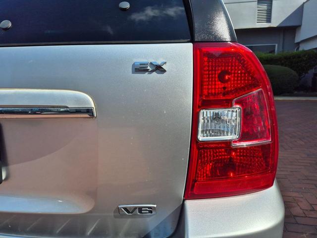Photo of 2010 Bright Silver Kia Sportage
