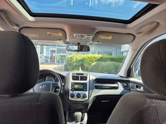 Photo of 2010 Bright Silver Kia Sportage