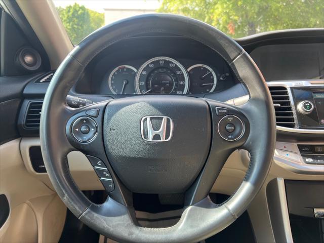Photo of 2015 White Orchid Pearl Honda Accord
