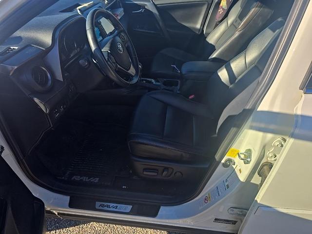 Photo of 2016 Super White Toyota RAV4