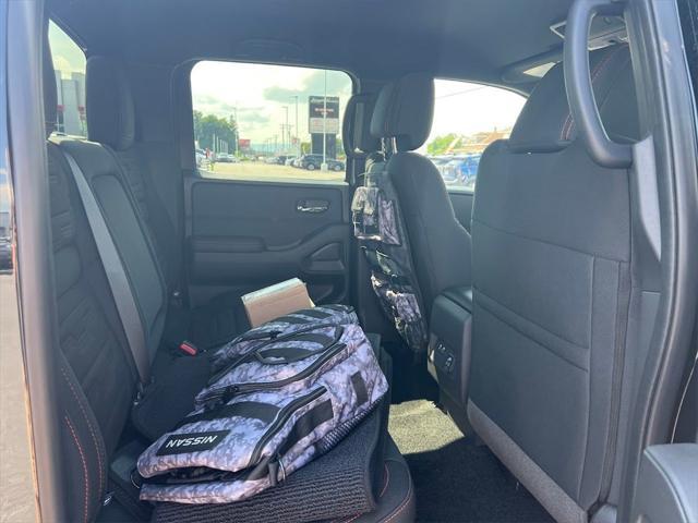 Photo of 2025 Super Black Nissan Frontier