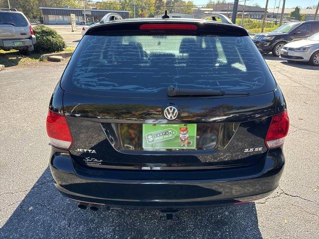 Photo of 2011 Black Uni Volkswagen Jetta SportWagen