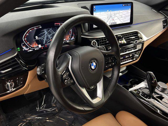 Photo of 2023 Arctic Race Blue Metallic BMW 530