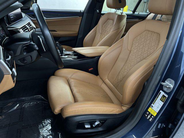 Photo of 2023 Arctic Race Blue Metallic BMW 530