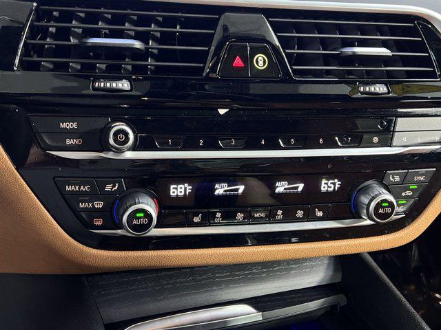 Photo of 2023 Arctic Race Blue Metallic BMW 530