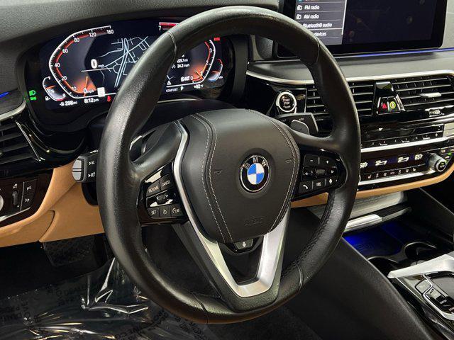 Photo of 2023 Arctic Race Blue Metallic BMW 530
