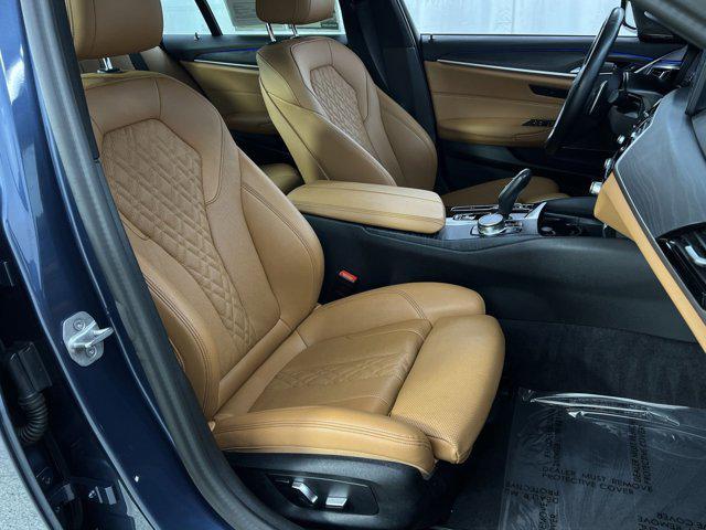 Photo of 2023 Arctic Race Blue Metallic BMW 530