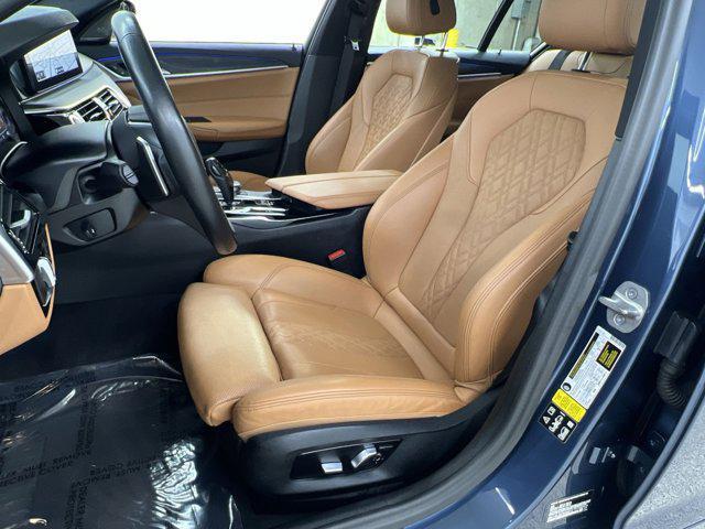 Photo of 2023 Arctic Race Blue Metallic BMW 530