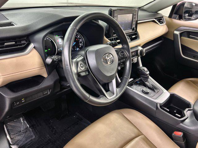 Photo of 2022 Ruby Flare Pearl Toyota RAV4 Hybrid
