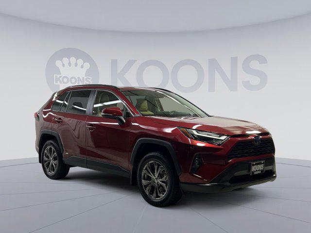 Photo of 2022 Ruby Flare Pearl Toyota RAV4 Hybrid
