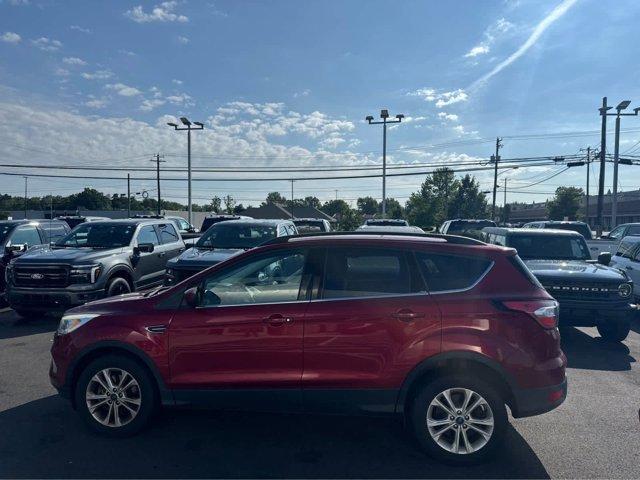 Photo of 2017 Ruby Red Metallic Tinted Clearcoat Ford Escape