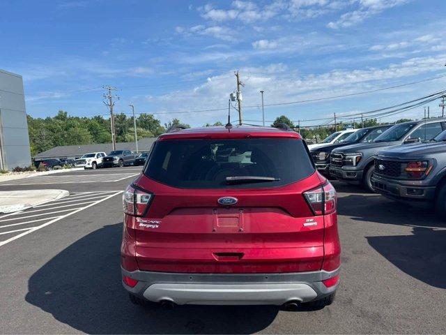 Photo of 2017 Ruby Red Metallic Tinted Clearcoat Ford Escape