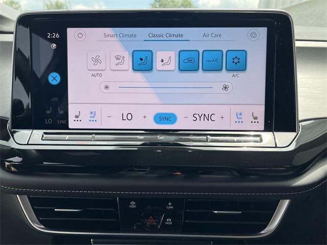 Photo of 2025 Opal White Pearl Volkswagen Atlas Cross Sport