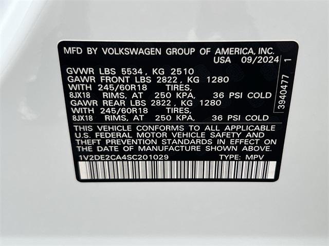 Photo of 2025 Opal White Pearl Volkswagen Atlas Cross Sport