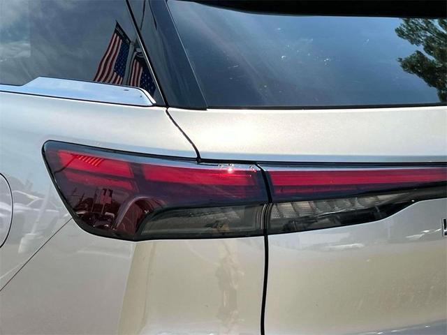Photo of 2025 Warm Titanium INFINITI QX60