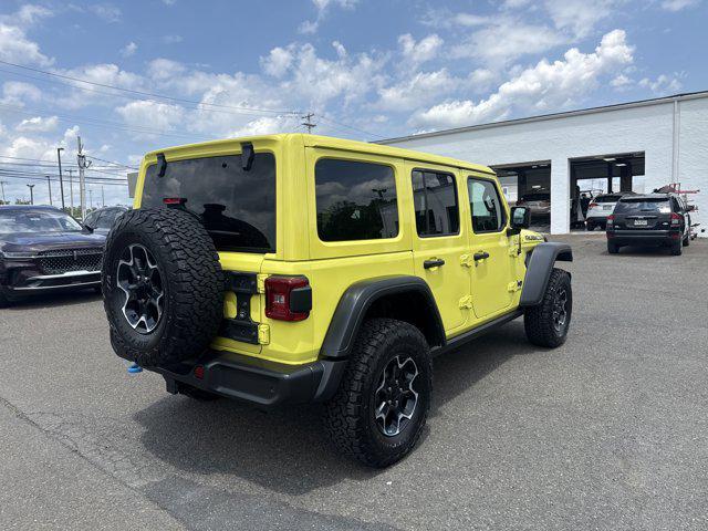 Photo of 2022 High Velocity Clearcoat Jeep Wrangler Unlimited 4xe